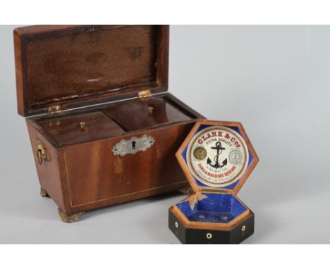 An early Victorian mahogany and brass line inlaid two-division tea caddy with ring handles, 9" wide, and a Clark and Co hexag