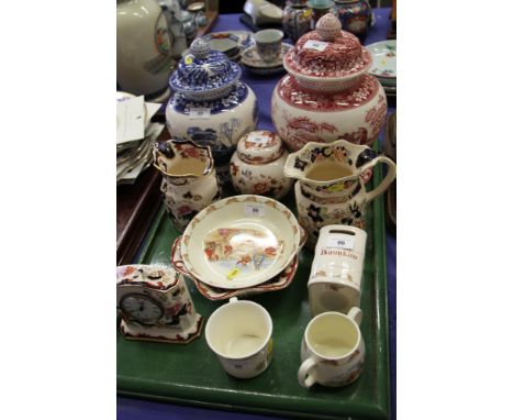 A Spode crimson transfer decorated vase and cover, a similar blue decorated vase and cover, a Masons Ironstone mantel clock, 