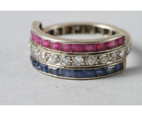 A yellow metal, diamond, ruby and sapphire dress ring, size N, 4.5gCondition:No apparent issues.Came from a private residence