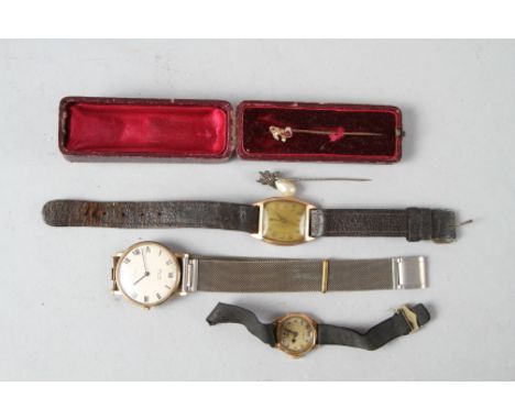 A gentleman's Avia 9ct gold cased 17 jewel manual-wind wristwatch, two other 9ct gold cased wristwatches, a yellow metal stic