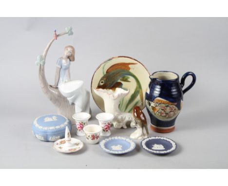 A Nao figure of a girl sat on a branch, three pieces of Wedgwood jasperware, a model bird and various other china 