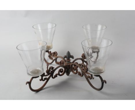 A wrought iron and anodised four-light chandelier, 22" wide 