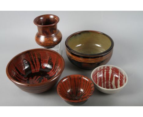 M W: a studio pottery bowl with resist glazed decoration, 11" dia, a deeper similar bowl, 10" dia, a bulbous vase, 6" high, a