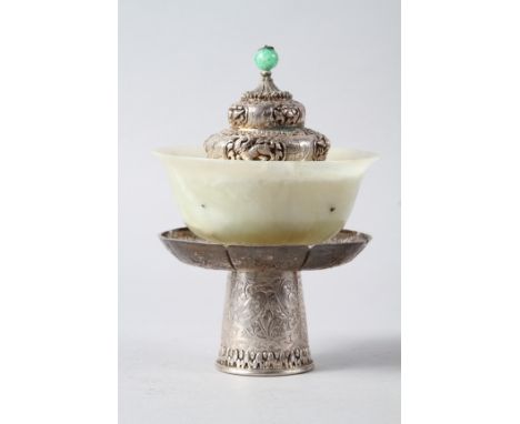 A Chinese ceremonial white metal cup, cover and stand with jade bowl, 7" highCondition:Some corrosion to white metal topJade 