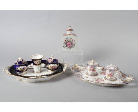 Two English porcelain double inkwells with floral decoration and an English porcelain tea caddy with floral decoration (damag