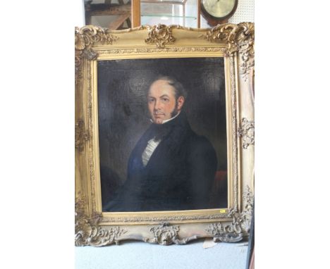 A mid 19th century oil on canvas, portrait of an unknown gentleman in dark waistcoat, 29 1/2" x 24", in deep gilt frame 