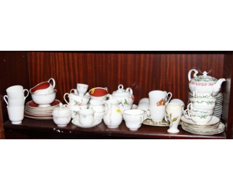 A Susie Cooper "Azalea" pattern part teaset, an Aynsley teaset for two, a Kaiser "Reverence" pattern part teaset and other te