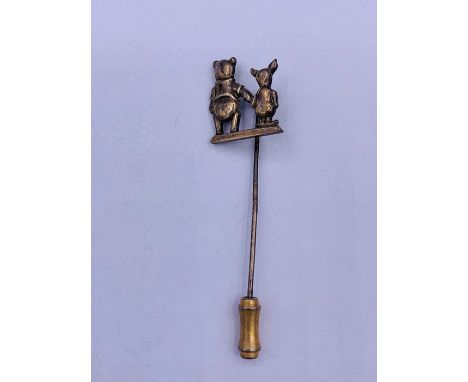 A Vintage Silver Winnie the Pooh lapel pin.
