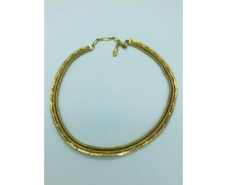 A pair of 1959 Grosse Vintage necklace.
