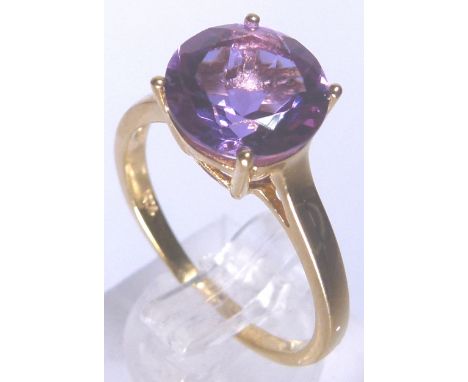 14 K COLOUR CHANGE RING. 14 K gold on silver lavender colour change ring, changes to pink and blue size P 3,25 ct