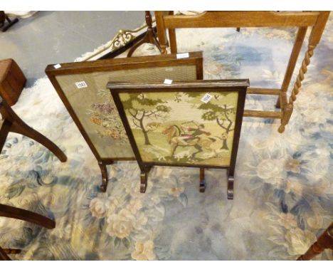 EMBROIDERED FIRE SCREENS. Two hand embroidered wooden surround fire screens