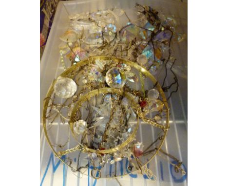 SWAROVSKI CRYSTALS. Large quantity of Swarovski crystals hung on a lamp shade