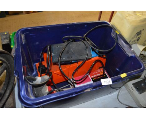 A box containing an electric drill, orbit sander etc.