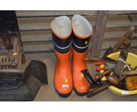 A pair of chainsaw safety boots