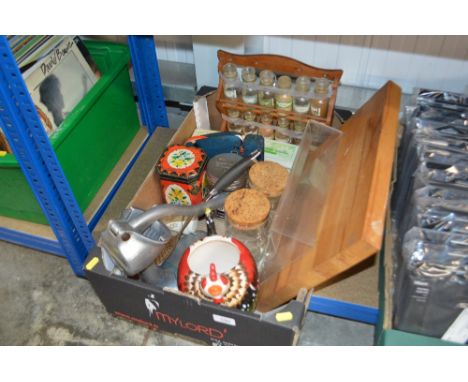 A box of various kitchenalia to include spice rack, chopping board, storage jars etc.