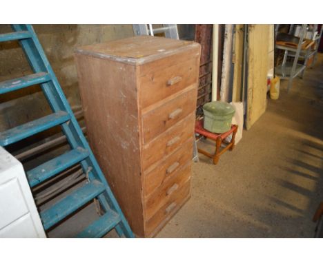 A tall chest fitted six drawers