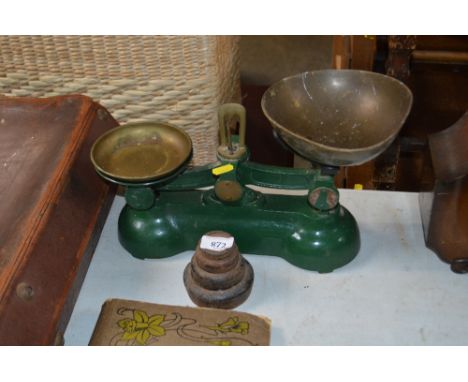 A set of kitchen scales and weights