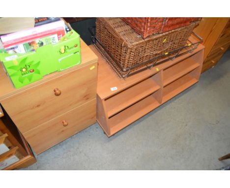 A beech effect storage unit; together with a pine effect bedside chest fitted two drawers