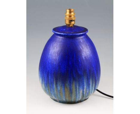 A Ruskin Pottery lamp base with ovoid body having cobalt blue, green and beige crystalline glaze, marked to base Ruskin Engla