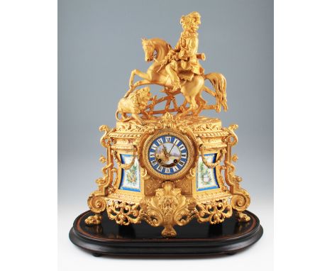 A late 19th Century ormolu mantel clock having cast man on horseback design with lion to top, lower body having ornate scroll