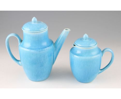 A Ruskin pottery soufflé glaze coffee pot and water pot, both in light blue turquoise colour with shouldered bodies with lids