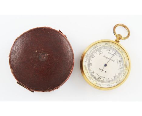 A gilt metal pocket barometer, housed in a fitted case (A/F).
