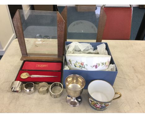 A silver commemorative Silver Jubilee letter opener, hallmarked London 1977, two silver napkin rings, one hallmarked London 1