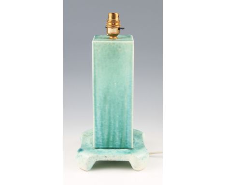 A Ruskin pottery lamp base with rectangular body on rounded square footed base, both having light green crystalline glaze, ma