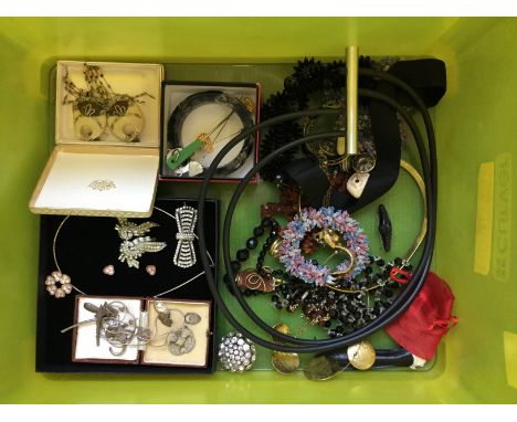 A collection of costume jewellery to include pendants, earrings, a bangle, hat pins, beads, a wrist watch, brooches etc.