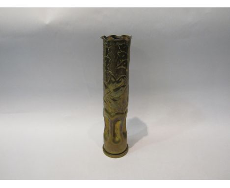 A circa 1943 possibly US army gunshell trench art vase decorated with flowering plants 25.5cm height 