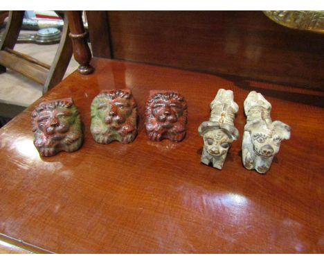 A pair of Georgian sash window dogs (a/f) and three Victorian sash window Lions (5) 