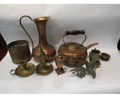 A collection of mixed metal wares to include copper jug, brass candlestick, copper 'Linaglow' teapot, etc