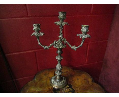 A Victorian Sheffield plate three branch candlestick stamped Edgars 642, 43.5cm tall