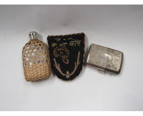 A Victorian silver cigarette case with engraved floral decoration and gilt interior, together with a wicker cased hip flask a