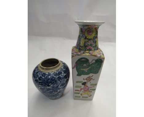 An early 20th Century ceramic hand painted Chinese vase, 31cm high and a blue and white     jar lacking lid 