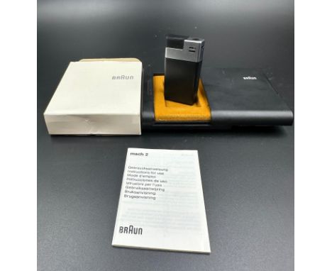 A vintage Braun Mach lighter in original box with paperwork 