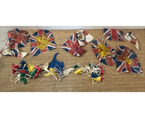 A selection of vintage flags and bunty, plastic and fabric, old fellows sash 