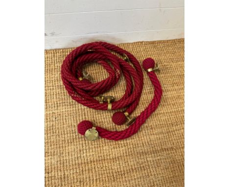 Two red balustrade or Bannister ropes with brass fixings (Length 440cm