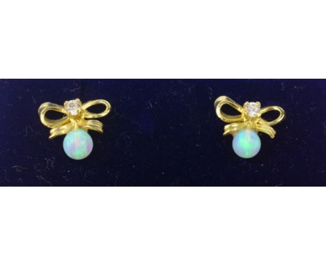 Pair of opal gold-plated bow ear-rings    Condition Report   Click here for further images, condition, auction times & delive