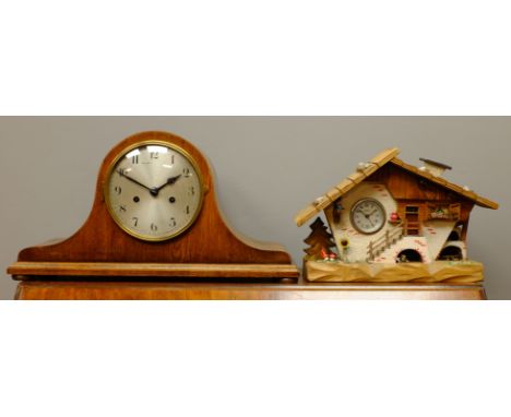 Early 20th century oak cased dome top mantel clock with 'Badische' movement and a Swiss cottage style mantel clock   Conditio