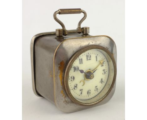 Late 19th century travel alarm clock, polished metal cased with circular enamel dial, with swan neck handle, inscribed 'Made 