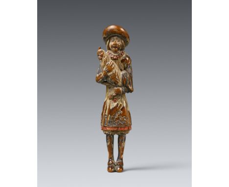 Netsuke eines Holländers mit Hahn. Holz mit Resten einer Farbfassung (saishiki). 19. Jh.Bez.: ShūzanMit eng zusammengestellte