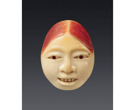Masken-Netsuke eines shōjō. Nashornvogelschnabel. 19. Jh.Oval, mit großen schmalen Augen, einer gut ausgearbeiteten Nase und 