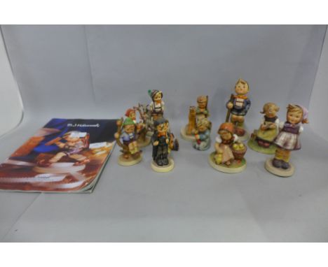 Eleven MJ Hummel figures including Appletree Boy and Girl, Which Hand?, etc., with a Hummel catalogue 