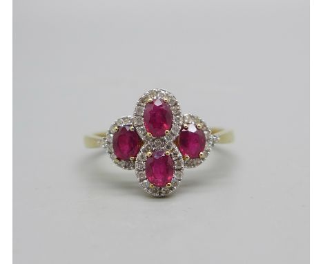 A 9ct gold, ruby and forty-two diamond ring, 2.3g, P 