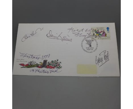 A Manchester United signed first day cover; George Best, Denis Law, Bobby Charlton, Shay Brennan 