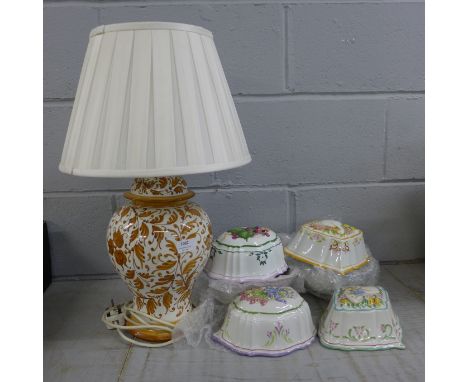 A table lamp and five Franklin Mint moulds, one a/f**PLEASE NOTE THIS LOT IS NOT ELIGIBLE FOR POSTING AND PACKING** 