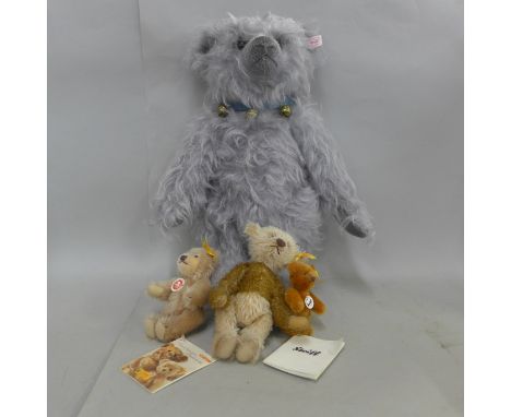 A large Steiff Teddy bear 'Bell Boy', two smaller Steiff bears and a key ring