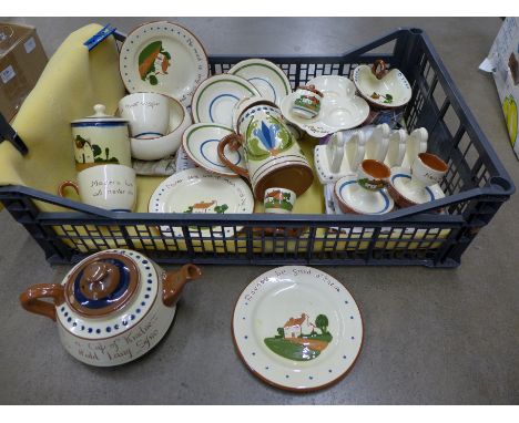 A collection of Cornish ware including a tea pot, jug, toast rack, cups, etc.**PLEASE NOTE THIS LOT IS NOT ELIGIBLE FOR POSTI