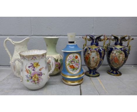 A collection of ceramic and pottery jugs, vases and a lamp**PLEASE NOTE THIS LOT IS NOT ELIGIBLE FOR POSTING AND PACKING** 